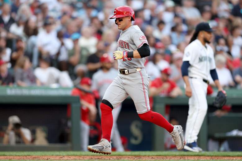 TJ Friedl crosses home plate for the Reds.