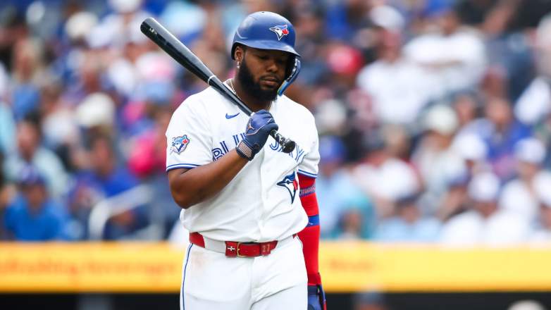 Toronto Blue Jays Vladimir Guerrero Jr walking with his baseball bat after striking out