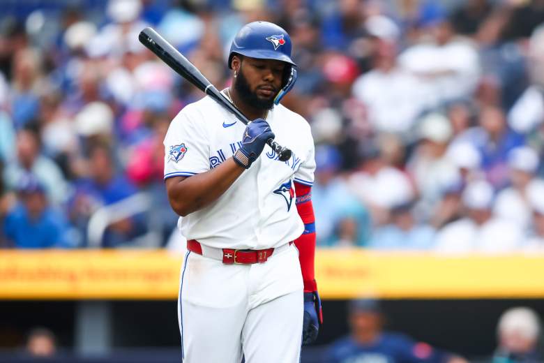 Vladimir Guerrero Jr. walks away from the plate in disappointment.