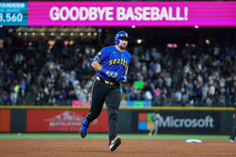 Cal Raleigh rounds the bases after a home run for the Mariners.