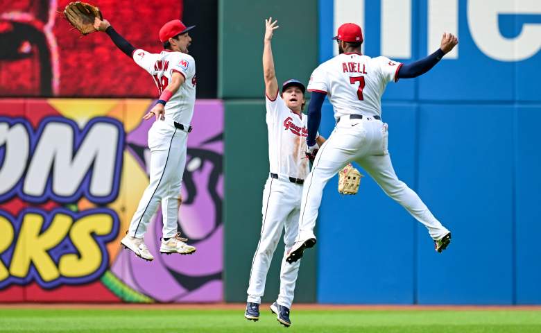 Guardians outfielders Steven Kwan, Petey Halpin and Jo Adell celebrate.