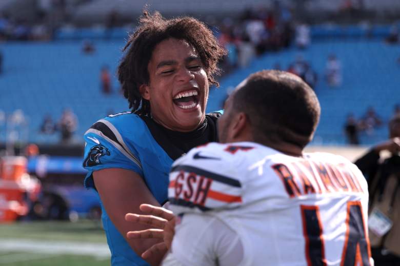 Jalen Coker of the Panthers and Kalif Raymond of the Bears share a postgame moment in Week 1.