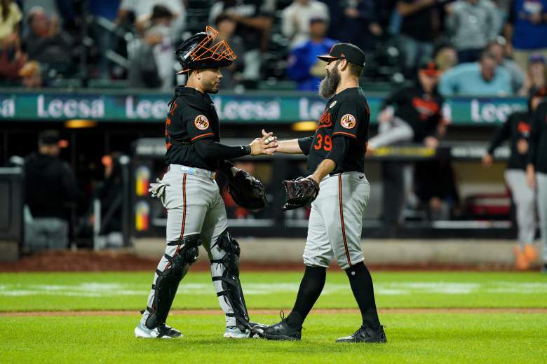 Andrew Kittredge ends a game with Orioles catcher Yohel Pozo.