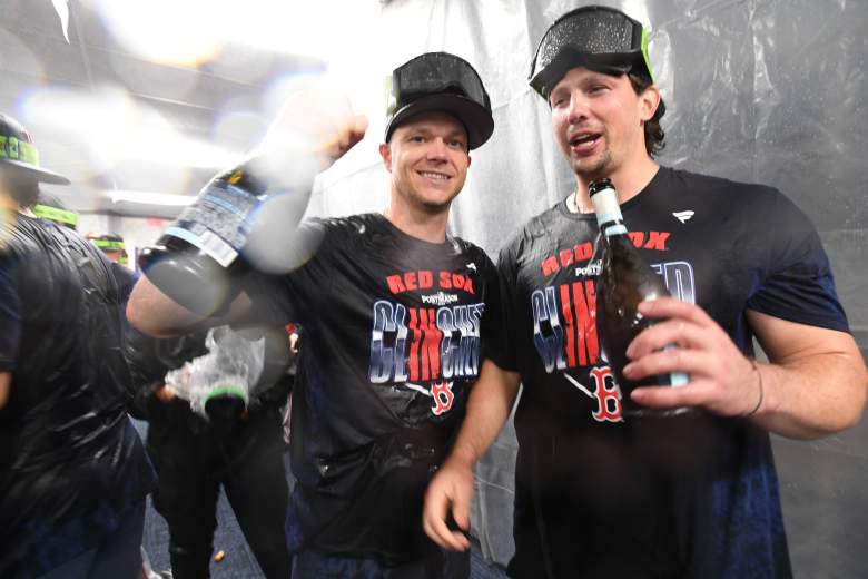 Sonny Gray and Adley Rutschman celebrate a playoff berth for the Red Sox.