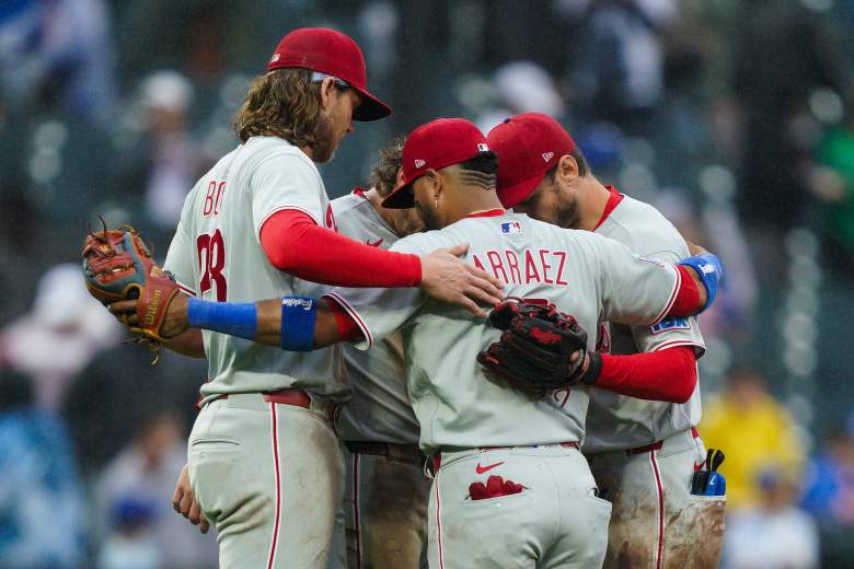 Phillies huddle on the mound.
