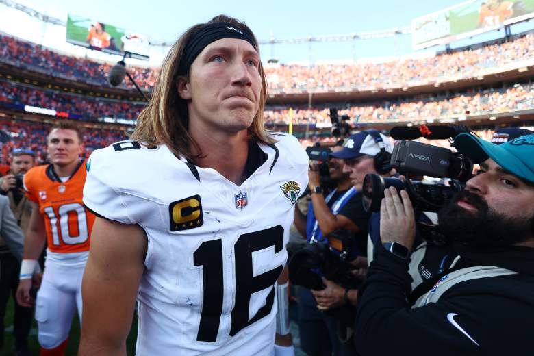 Jaguars QB Trevor Lawrence walks off the field in Denver.