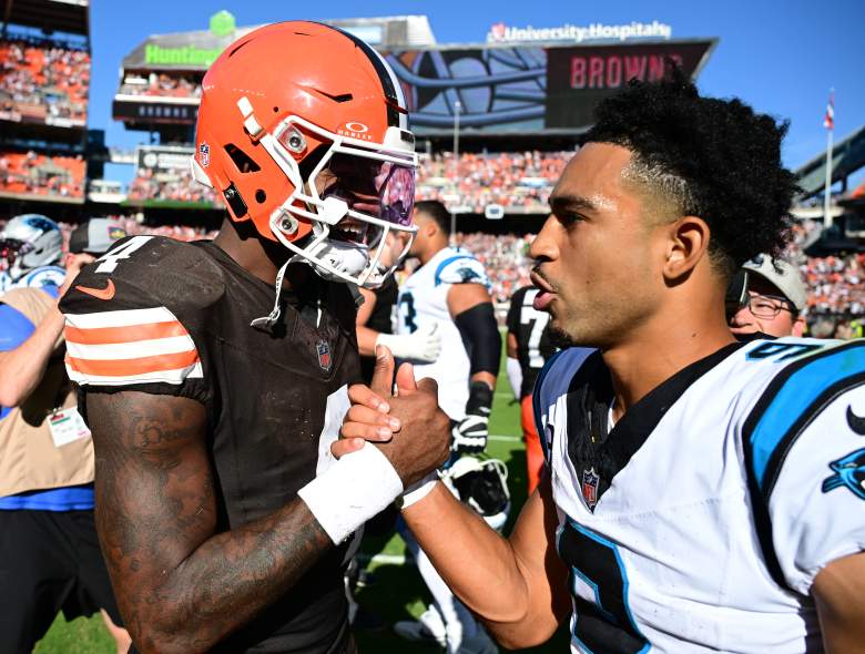 Bryce Young shakes hands with Deshaun Watson after the Panthers lost to the Browns.