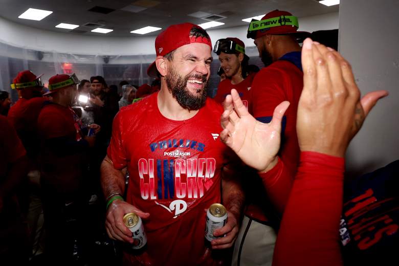 Kyle Schwarber celebrates in the Phillies' clubhouse.