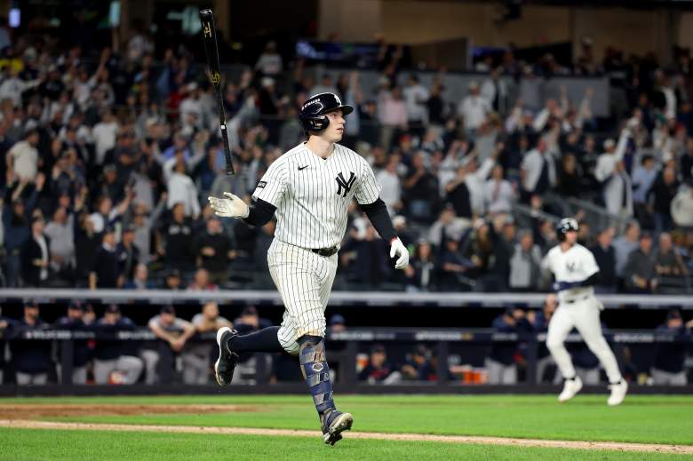 Ben Rice flips his bat for the New York Yankees.