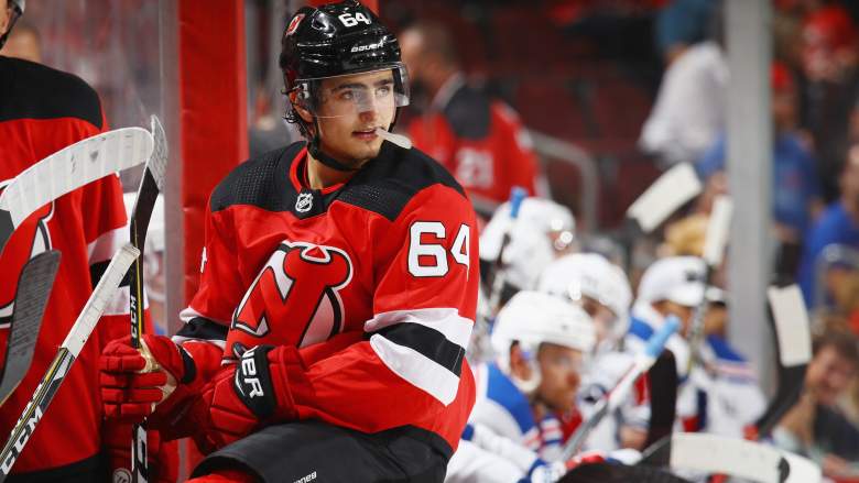 Joseph Blandisi sits on the boards while the Devils play the New York Rangers