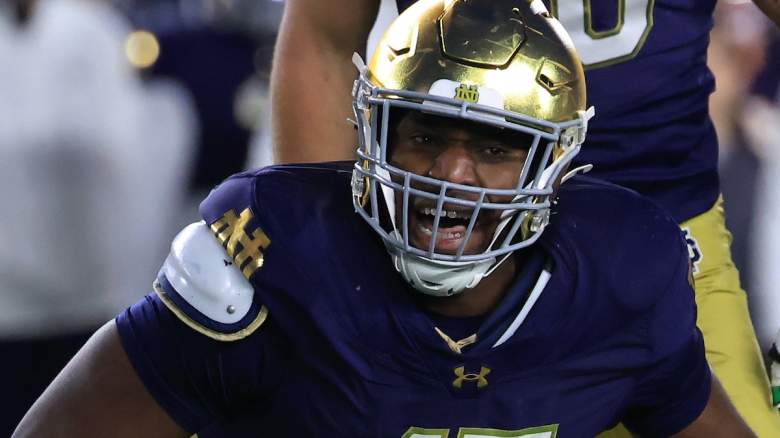 Jason Onye #47 of the Notre Dame Fighting Irish celebrates