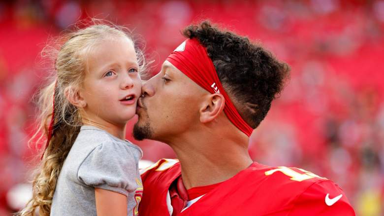 Quarterback Patrick Mahomes #15 of the Kansas City Chiefs kisses his daughter, Sterling Mahomes, prior to the preseason game between the Kansas City Chiefs and the Seattle Seahawks at Arrowhead Stadium on August 28, 2026