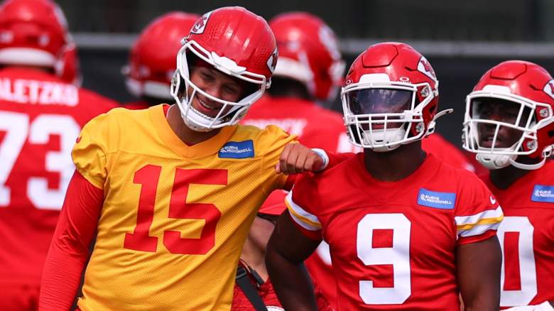 Patrick Mahomes #15 of the Kansas City Chiefs leans on Kenneth Walker #9 in mandatory minicamp at The University of Kansas Hospital Arrowhead Training Complex on June 10, 2026 in Kansas City, Missouri.