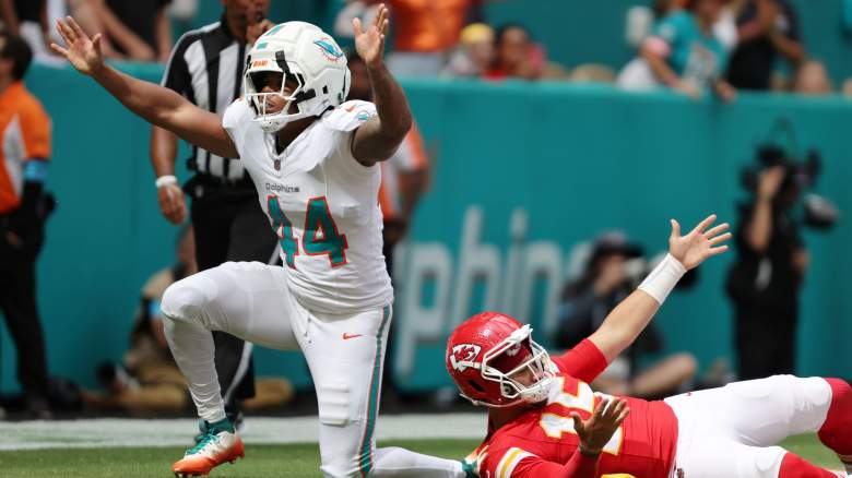 Chop Robinson #44 of the Miami Dolphins and Patrick Mahomes #15 of the Kansas City Chiefs react to a callduring the second half at Hard Rock Stadium on September 27, 2026 in Miami Gardens, Florida