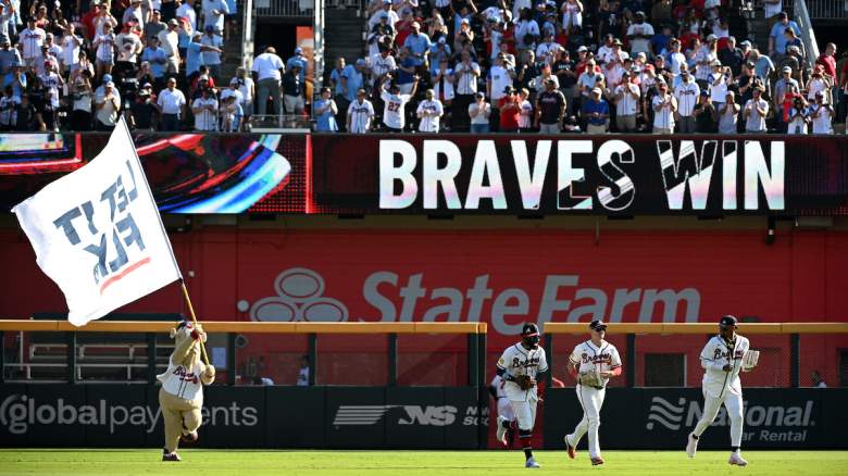 Ronald Acuna Jr. #13, Michael Harris II #23, and Mike Yastrzemski #18 of the Atlanta Braves celebrate defeating the Philadelphia Phillies