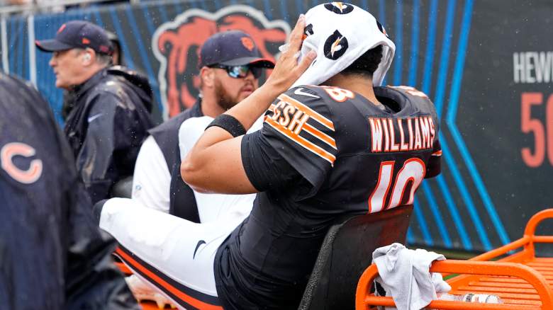 Caleb Williams #18 of the Chicago Bears is carted off the field