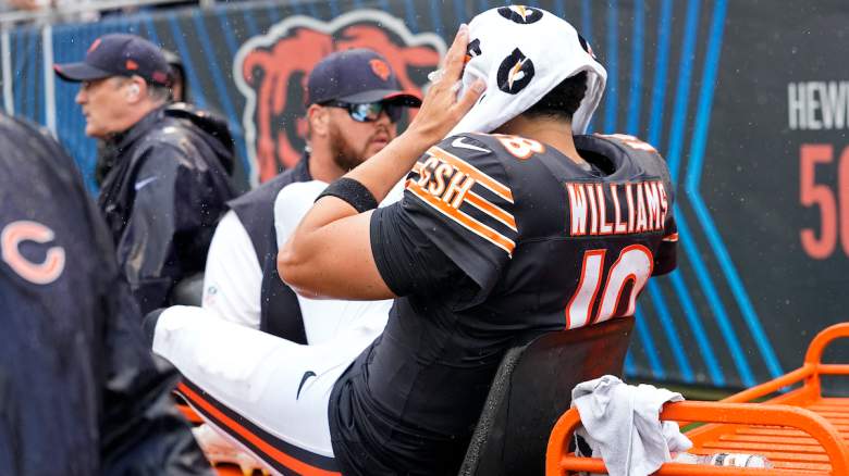 Caleb Williams #18 of the Chicago Bears is carted off the field