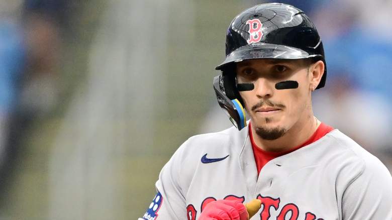 Jarren Duran #16 of the Boston Red Sox celebrates on first base after hitting a single