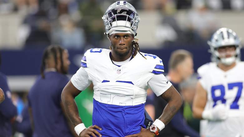 Joe Milton III #10 of the Dallas Cowboys participates in warmups