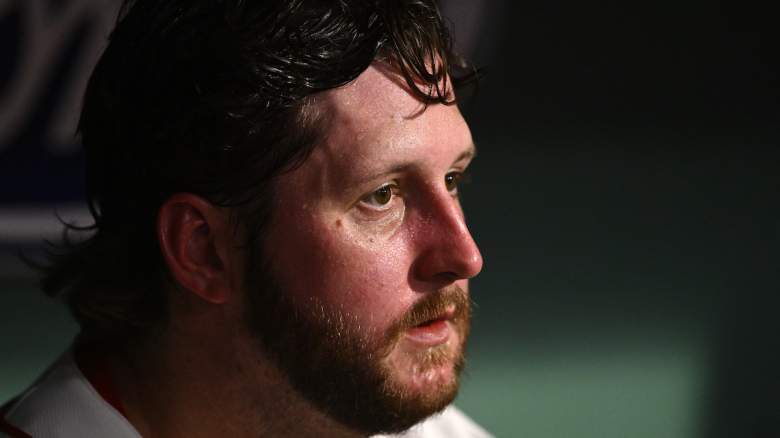 Justin Slaten #63 of the Boston Red Sox watches a game