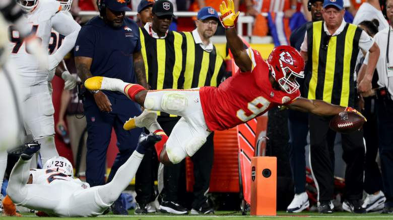 Kenneth Walker III #9 of the Kansas City Chiefs dives for a first down