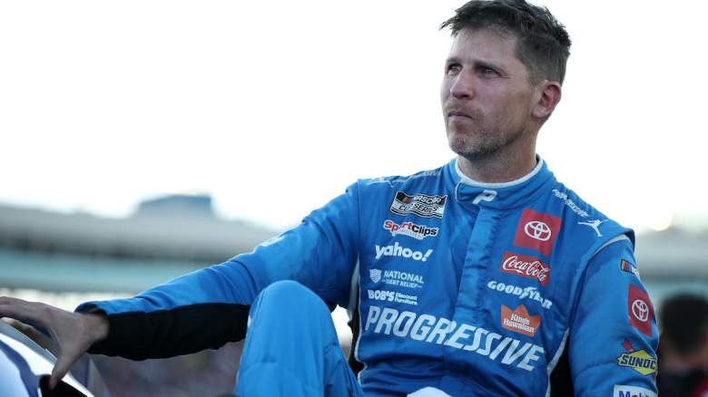 Denny Hamlin, driver of the #11 Progressive Toyota, exits his car