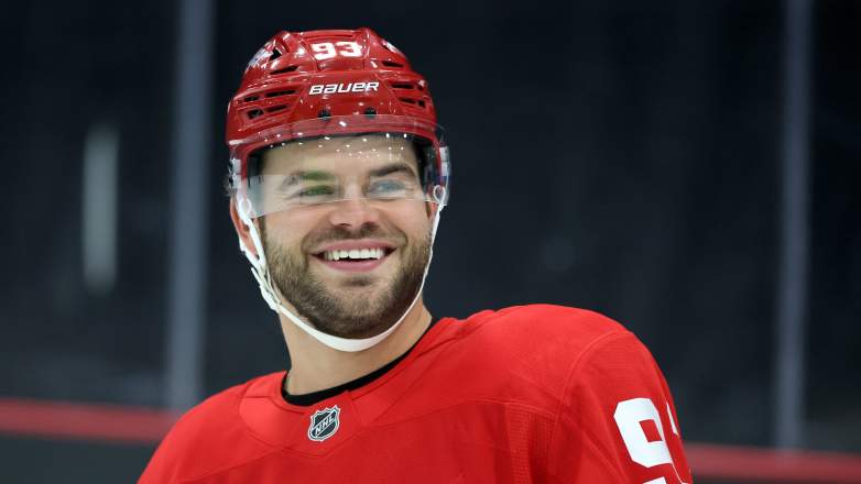 Alex DeBrincat is happy to remain with the Detroit Red Wings.