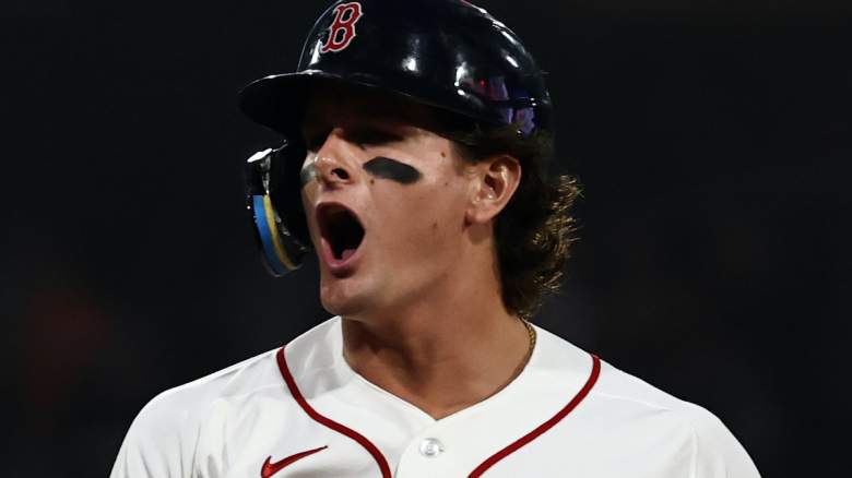 Roman Anthony #19 of the Boston Red Sox shouts out after his RBI single against the Kansas City Royals