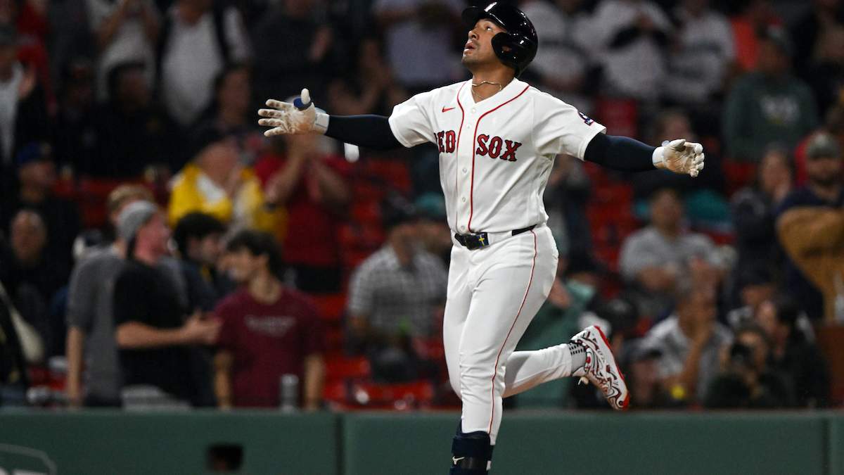 Jahmai Jones #37 of the Boston Red Sox reacts after hitting a two-run home run