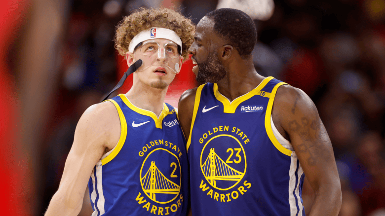 Brandin Podziemski and Draymond Green