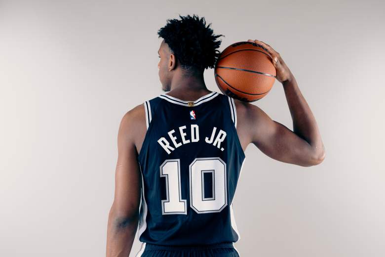 Tarris Reed Jr. poses with a basketball during the NBA rookie photo shoot in Las Vegas