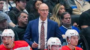 Calgary Flames head coach Ryan Huska looks on during the second period of their NHL game against the Vancouver Canucks at Rogers Arena on October 9, 2024 in Vancouver, British Columbia, Canada.