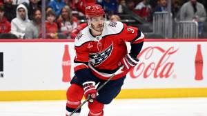 Matt Roy #3 of the Washington Capitals handles the puck against the Colorado Avalanche at Capital One Arena on March 22, 2026 in Washington, DC