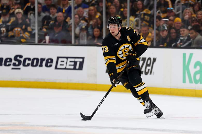 Charlie McAvoy skates for the Bruins.