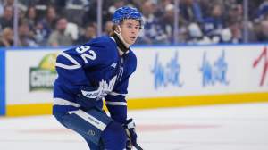 Gavin McKenna #92 of the Toronto Maple Leafs playing in his first career NHL game, skates against the Montr&eacute;al Canadiens at Scotiabank Arena on September 29, 2026 in Toronto, Ontario, Canada.