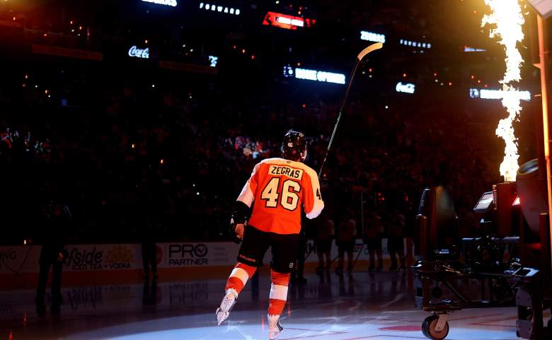 Trevor Zegras skates onto the ice.