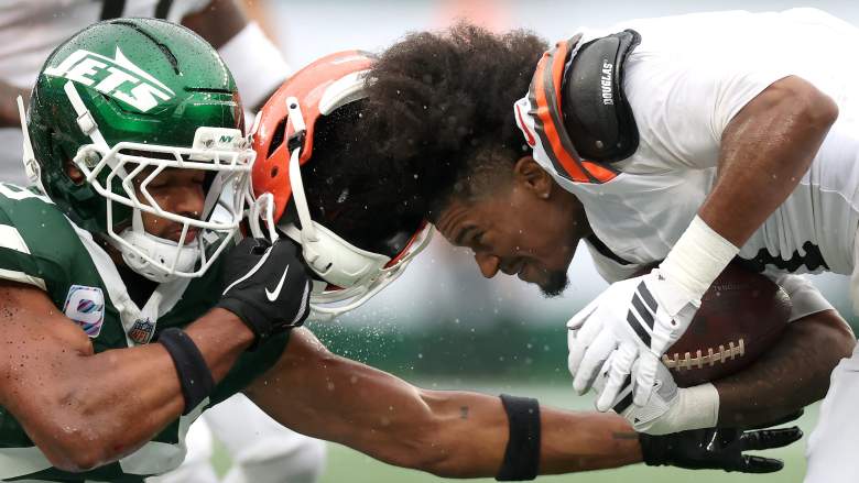 Minkah Fitzpatrick #29 of the New York Jets is called for a face mask during the first quarter of the game against Kc Concepcion #1 of the Cleveland Browns
