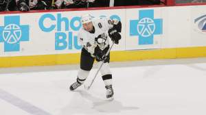 Defenseman Lyle Odelein #24 of the Pittsburgh Penguins passes the puck during the NHL game against the Philadelphia Flyers on November 16, 2005 at Wachovia Center in Philadelphia, Pennsylvania. The Penguins won 3-2.