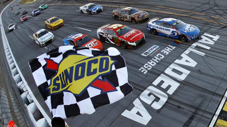 Kyle Larson, driver of the #5 HendrickCars.com Chevrolet, takes the checkered flag t