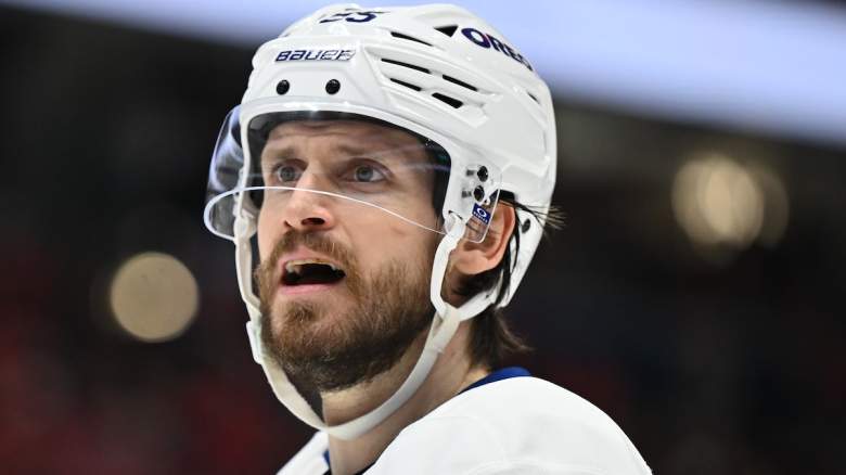 Oliver Ekman-Larsson #95 of the Toronto Maple Leafs questions a referee