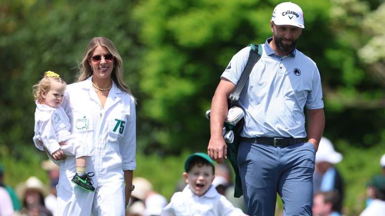 Jon Rahm walks with wife Kelley Cahill and their children at the 2026 Masters