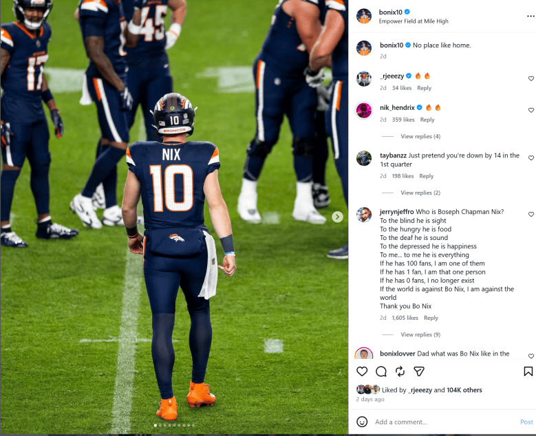 Bo Nix walks on the field in a Denver Broncos uniform at Empower Field at Mile High.