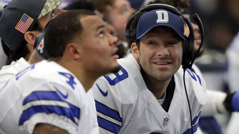Tony Romo #9 talks with Dak Prescott #4 and Mark Sanchez #3 of the Dallas Cowboys on the bench during the first half of the game against the Baltimore Ravens at AT&T Stadium on November 20, 2016 in Arlington, Texas