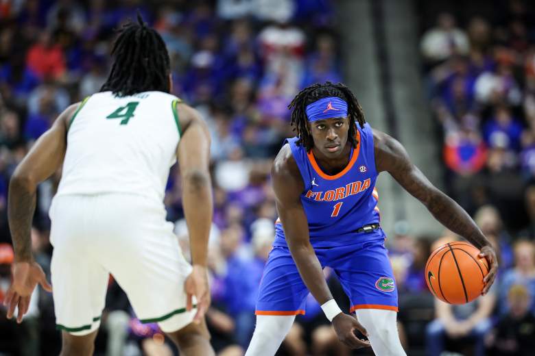 Denzel Aberdeen scanning the floor as a point guard
