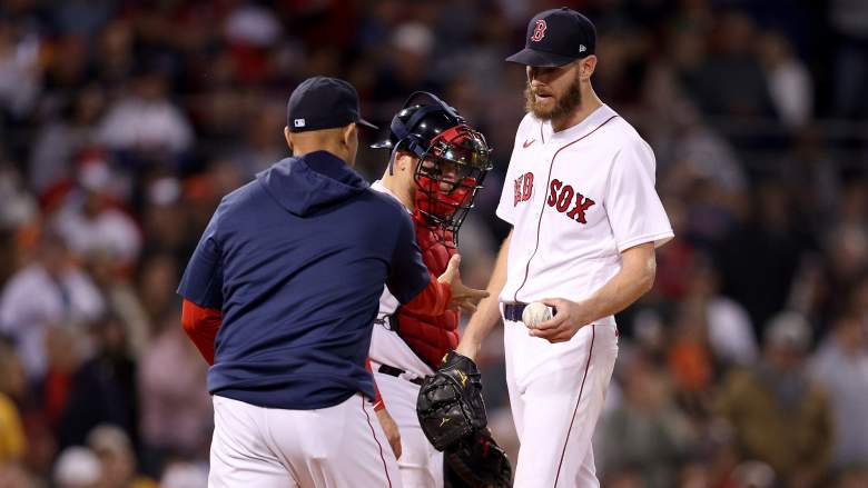 Former Boston Red Sox manager Alex Cora and starting pitcher Chris Sale