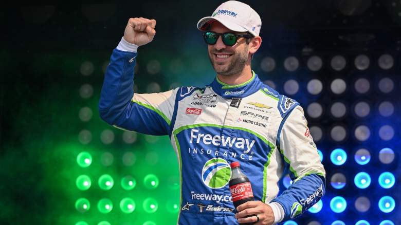 Daniel Suarez, driver of the #7 Freeway Insurance Chevrolet, waves to fans as he walks onstage