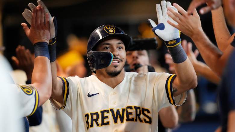 David Hamilton #6 of the Milwaukee Brewers is congratulated