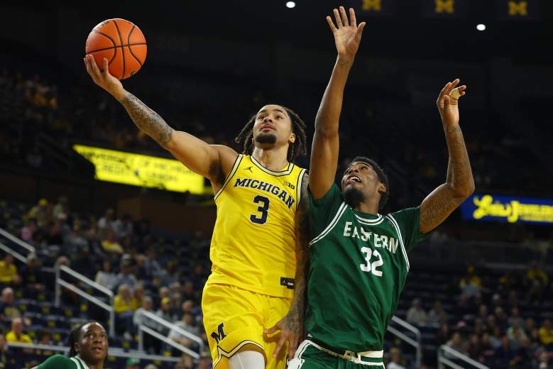 Elliot Cadeau is making a layup against Eastern Michigan