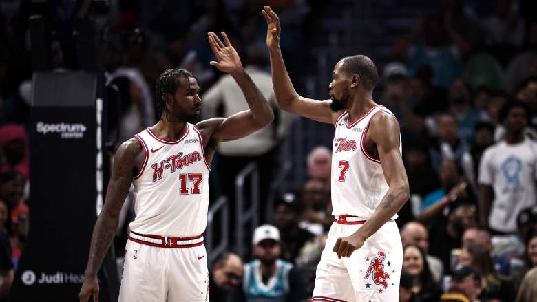 Houston Rockets Kevin Durant and Tari Eason high-fiving against the Hornets