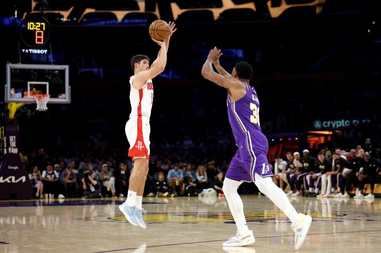 Houston Rockets guard Reed Sheppard is shooting a three against the Lakers